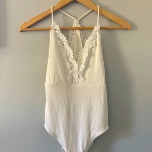 Ribbed White V-Neck Bodysuit